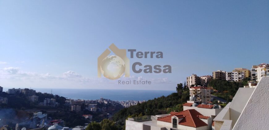 Tilal ain saade fully decorated duplex with sea view .