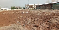 kabelias 12500 sqm land near main road with houses and farm for sale