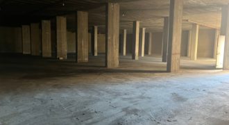 warehouse for rent in haouch el omara with truck entrance prime location