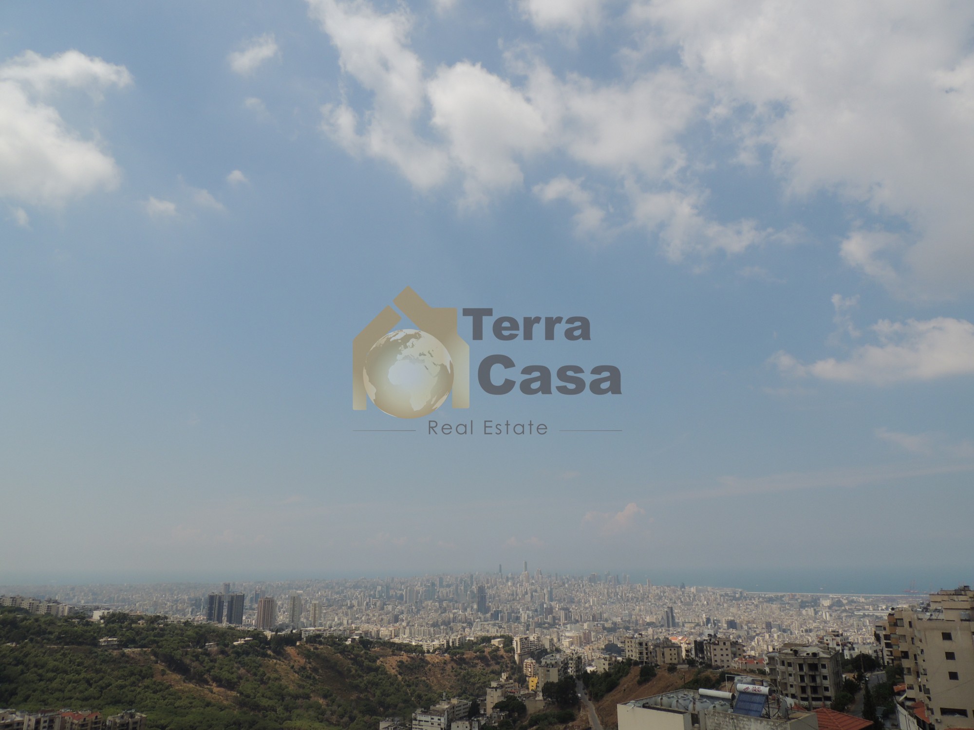 Duplex for sale in Fanar fully decorated  with open sea and mountain view .