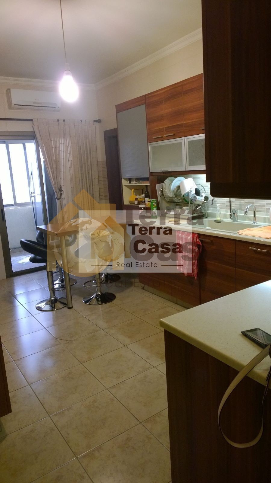 apartment for sale in ain najem luxurious fully decorated prime location .