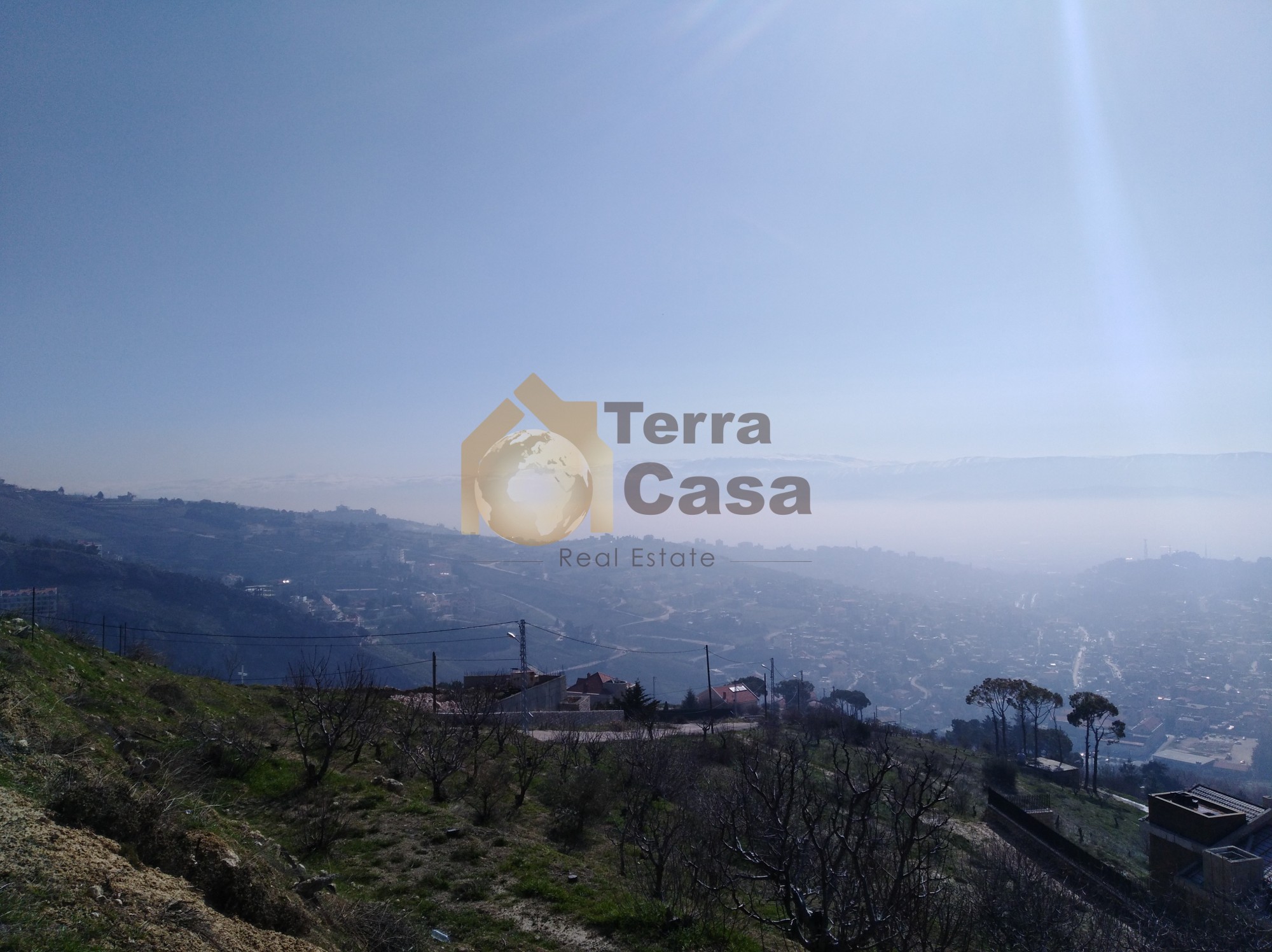 land for sale in zahle overlooking the city with panoramic view .
