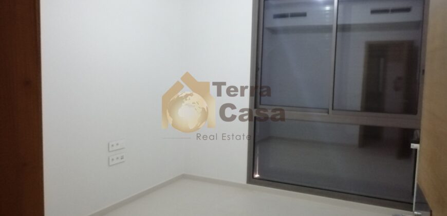 apartment  in Dbayeh waterfront city brand new .Ref#925