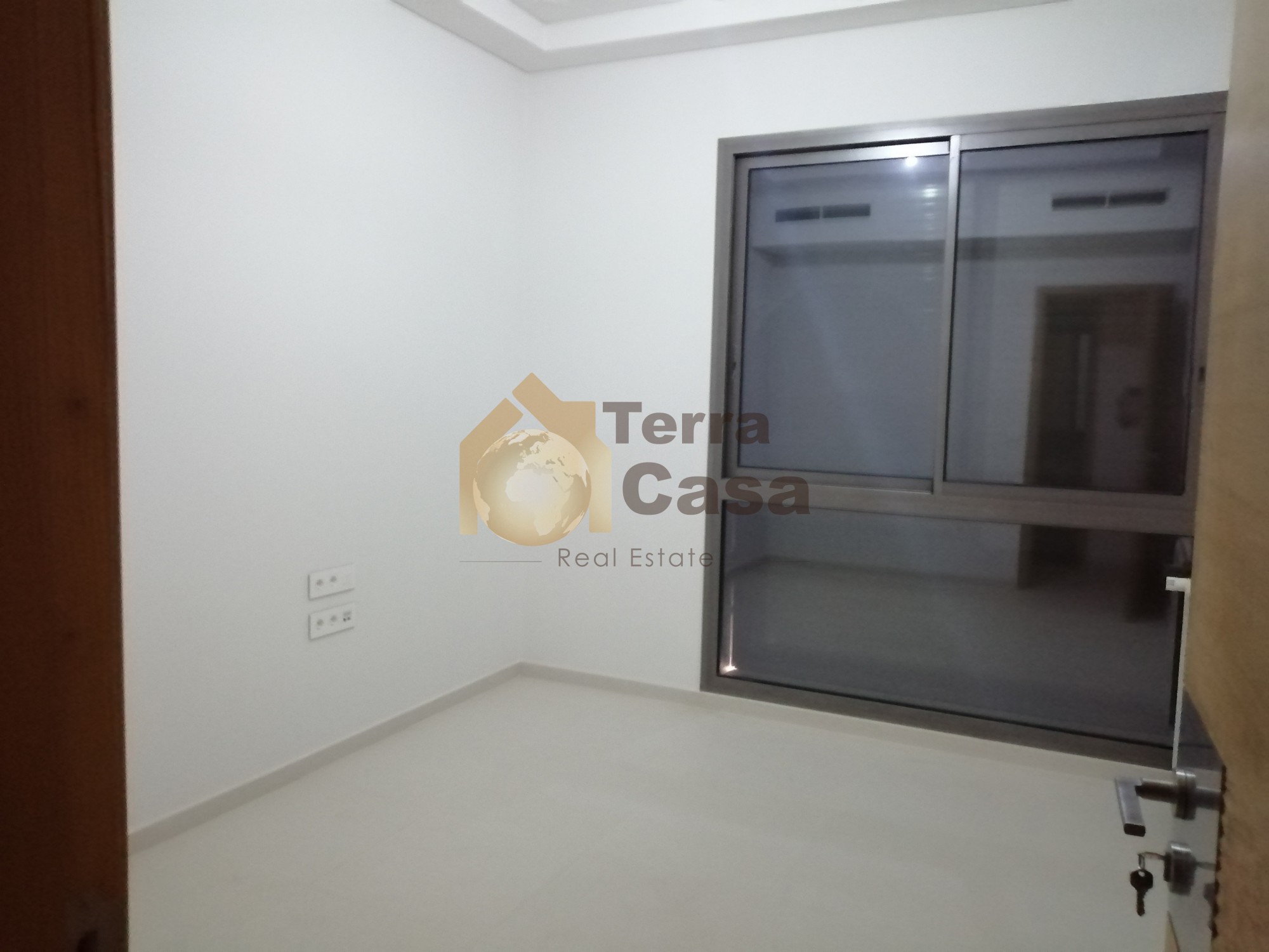 apartment  in Dbayeh waterfront city brand new .Ref#925