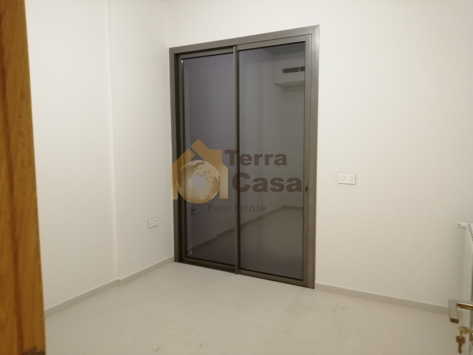 Apartment in Dbayeh waterfront city brand new. Ref#926