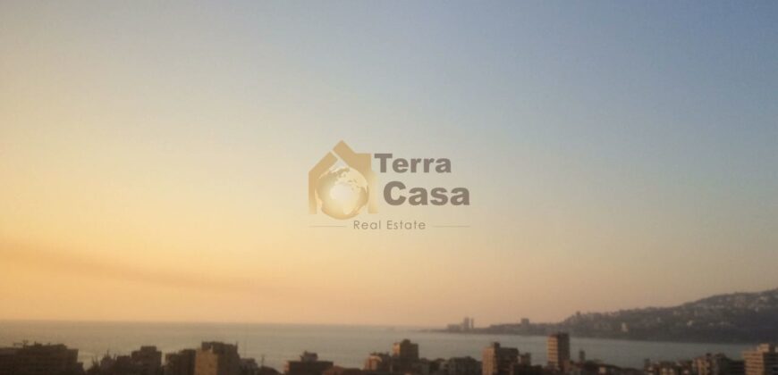 land for sale in ghadir with old building on it close to the main highway.