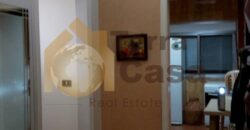 Mazraat yachouh fully furnished and decorated apartment with partial sea view for sale .