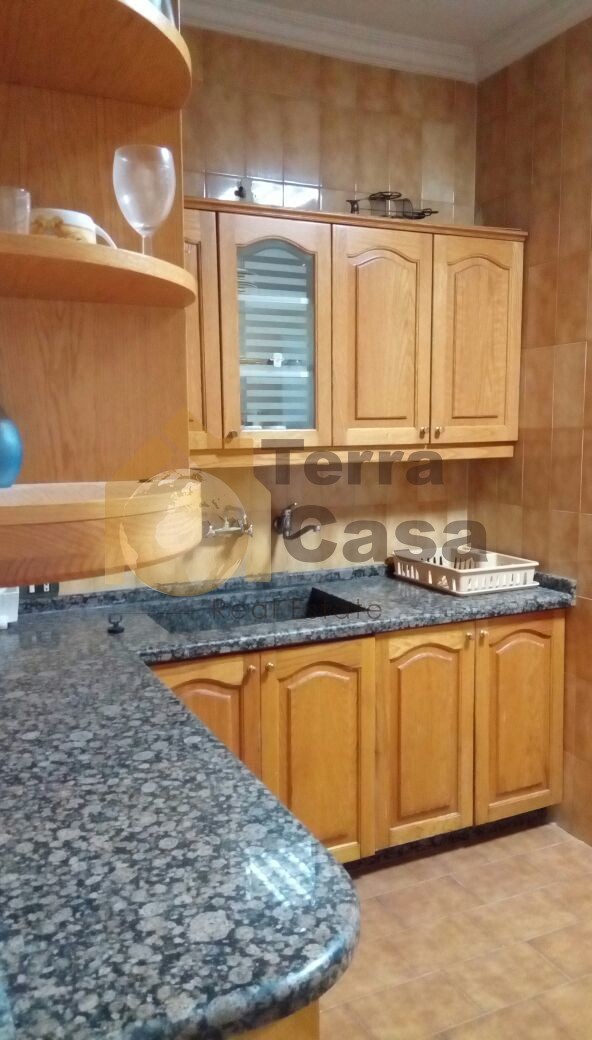 Mazraat yachouh fully furnished and decorated apartment with partial sea view for sale .