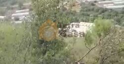 Land in Ferhit Jbeil located in nice area  mountain view ,banker check accepted