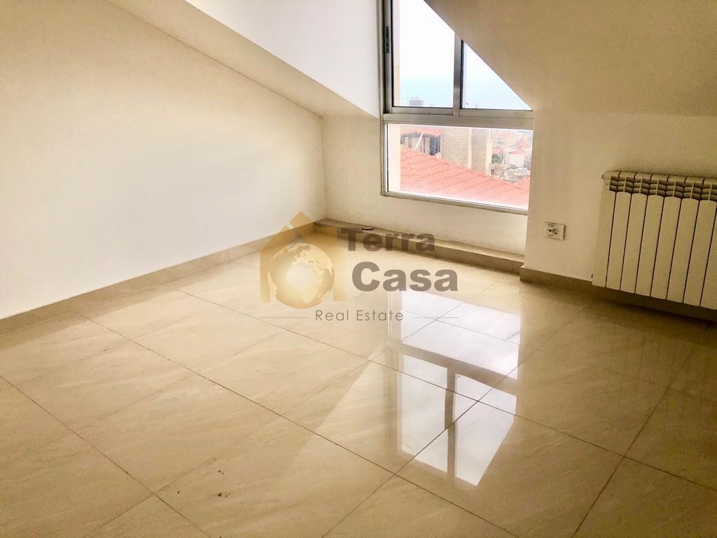 Brand new apartment with roof and 70 sqm terrace .