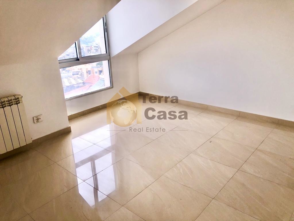 Brand new apartment with roof and 70 sqm terrace .