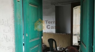 zahle midan small land with old house for sale .