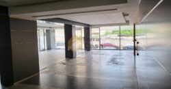 ain el remmaneh showroom prime location for rent .