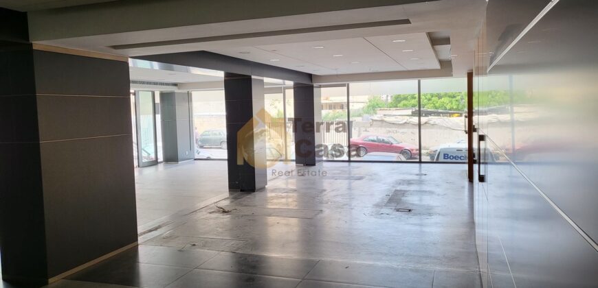 ain el remmaneh showroom prime location for rent .