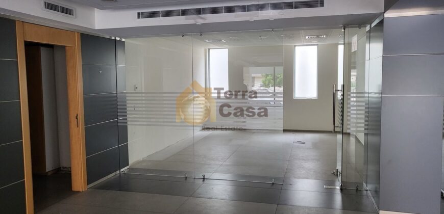 ain el remmaneh showroom prime location for rent .