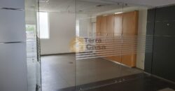 ain el remmaneh showroom prime location for rent .