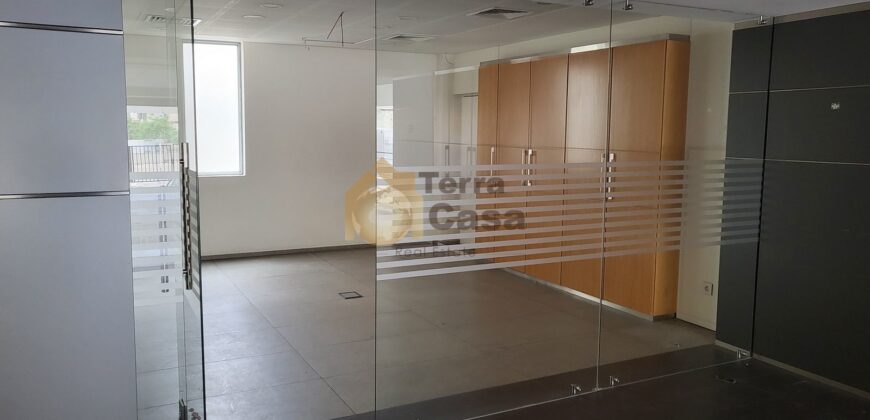 ain el remmaneh showroom prime location for rent .