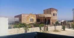 Nasriit rizk a whole building with land for sale .